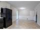 Bright kitchen featuring a full view of the door to the exterior patio and side door at 3664 Satellite Ter, Ellenwood, GA 30294