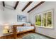 Bedroom featuring hardwood floors, and a large window at 1619 Folkstone Ne Rd, Brookhaven, GA 30329
