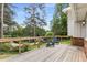 Relaxing deck with wooded railing, great for outdoor lounging and scenic views at 1619 Folkstone Ne Rd, Brookhaven, GA 30329