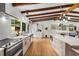 Spacious kitchen featuring stainless steel appliances and an island with barstool seating at 1619 Folkstone Ne Rd, Brookhaven, GA 30329