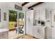 Bright kitchen with sliding glass doors leading to an outdoor patio area at 1619 Folkstone Ne Rd, Brookhaven, GA 30329