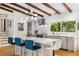 Bright kitchen with island seating, modern appliances, and natural light at 1619 Folkstone Ne Rd, Brookhaven, GA 30329