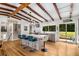 Modern kitchen features an island with bar seating, stainless steel appliances, and plenty of counter space at 1619 Folkstone Ne Rd, Brookhaven, GA 30329