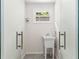 Bright laundry area with sink and modern fixtures at 1619 Folkstone Ne Rd, Brookhaven, GA 30329