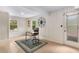 Well-lit office space with desk, chair, and tile flooring at 1619 Folkstone Ne Rd, Brookhaven, GA 30329