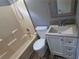 Cozy bathroom featuring a shower-tub combo and a white vanity at 2799 Mockingbird Cir, Duluth, GA 30096