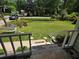 Inviting front entrance, lush green lawn, and charming neighborhood street at 2799 Mockingbird Cir, Duluth, GA 30096