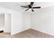 Cozy bedroom featuring carpeted floors, a ceiling fan, and ample natural light at 3022 Kentmere Dr, Cumming, GA 30040