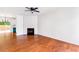 Spacious living room with hardwood floors and a cozy fireplace at 3022 Kentmere Dr, Cumming, GA 30040