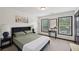 Comfortable bedroom with neutral tones, natural light, and stylish decor at 4430 Cedar Bridge Walk, Suwanee, GA 30024