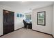 Bright bedroom with carpeted floors, a dark trim, and natural light with windows at 4430 Cedar Bridge Walk, Suwanee, GA 30024