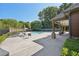 Neighborhood pool with a covered lounge area and lounge chairs in the sun at 4430 Cedar Bridge Walk, Suwanee, GA 30024