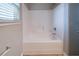 Bathroom with a tub-shower featuring a white surround at 535 Pierpoint Dr, Atlanta, GA 30331