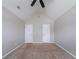 Spacious bedroom with neutral walls, carpet, and two white paneled doors at 535 Pierpoint Dr, Atlanta, GA 30331