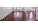 Beautiful living room with hardwood flooring, wainscoting, and bay window at 535 Pierpoint Dr, Atlanta, GA 30331
