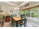Cozy dining area with bright lighting and a view of the backyard at 545 Creek Landing Ln, Alpharetta, GA 30005