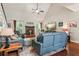 Inviting living area boasts hardwood floors, a cozy fireplace, and ample natural light at 545 Creek Landing Ln, Alpharetta, GA 30005