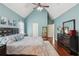 Spacious bedroom with a ceiling fan, hardwood floors, and natural light at 545 Creek Landing Ln, Alpharetta, GA 30005
