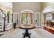 Welcoming home foyer featuring a decorative table and an eye-catching zebra-print rug at 560 Indigo Dr, Roswell, GA 30075