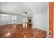 Open living room with hardwood floors, a stone fireplace, and ample natural light at 6182 Silver Spur Dr, Lithonia, GA 30058