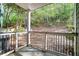 View from balcony overlooking a wooded area, perfect for relaxing at 8106 Santa Fe Pkwy, Atlanta, GA 30350