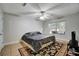 Spacious bedroom offers natural light and a ceiling fan at 8106 Santa Fe Pkwy, Atlanta, GA 30350