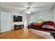 Cozy bedroom offers natural light and hardwood floors at 8106 Santa Fe Pkwy, Atlanta, GA 30350