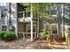 Enclosed patio with outdoor space, privacy fence and mature trees at 8106 Santa Fe Pkwy, Atlanta, GA 30350