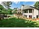 Beautiful backyard with a hot tub, outdoor kitchen, and pool at 1114 Waterford Green Pt, Marietta, GA 30068