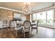 Dining room features a large window, chandelier, and seating for six at 1114 Waterford Green Pt, Marietta, GA 30068