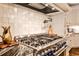 Custom gourmet range and tile backsplash in kitchen at 1114 Waterford Green Pt, Marietta, GA 30068
