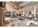 Open floor plan living room with fireplace, columns, and high ceilings at 1114 Waterford Green Pt, Marietta, GA 30068