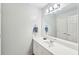 Bathroom featuring a vanity with white marble countertops and a large mirror at 1275 Smokehouse Trl, Cumming, GA 30041