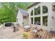 Spacious back deck with outdoor seating and grilling area at 1275 Smokehouse Trl, Cumming, GA 30041