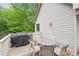 Back deck with grill and outdoor table and chairs at 1275 Smokehouse Trl, Cumming, GA 30041