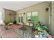 Covered back patio with plants and outside lighting at 1275 Smokehouse Trl, Cumming, GA 30041