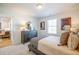 Cozy bedroom with decorative wall art, natural light, and comfortable furnishings at 1712 Fulmont Cir, Mableton, GA 30126