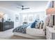 Bright bedroom with a ceiling fan, large windows, and neutral-toned decor at 1712 Fulmont Cir, Mableton, GA 30126