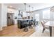 Kitchen with stainless appliances, central island, hardwood floors, and breakfast bar at 1712 Fulmont Cir, Mableton, GA 30126