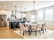 Kitchen with stainless appliances, central island, hardwood floors, and dining area at 1712 Fulmont Cir, Mableton, GA 30126