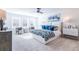 Spacious main bedroom with plush carpeting, large windows, and a comfortable bed at 1712 Fulmont Cir, Mableton, GA 30126