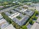 Aerial view of the complex, surrounded by mature trees, offering a serene living environment at 1850 Cotillion Dr # 3114, Atlanta, GA 30338