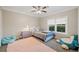 Cozy bedroom with plush carpeting, neutral walls, and a bright window at 1850 Cotillion Dr # 3114, Atlanta, GA 30338