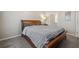 Neutral bedroom with dark wood furniture, gray carpet, and a closet at 1850 Cotillion Dr # 3114, Atlanta, GA 30338