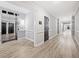 Hallway with an elevator on the left and apartment doors on the right at 1850 Cotillion Dr # 3114, Atlanta, GA 30338