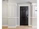 Elegant black front door featuring decorative trim and a keyless entry system at 1850 Cotillion Dr # 3114, Atlanta, GA 30338