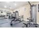 Gym features weight machines, a mirror and wall mounted televisions at 1850 Cotillion Dr # 3114, Atlanta, GA 30338