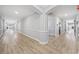Wide hallway with wood floors, gray walls and white trim at 1850 Cotillion Dr # 3114, Atlanta, GA 30338