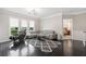 Spacious living room with dark floors, neutral walls, and ample natural light at 1850 Cotillion Dr # 3114, Atlanta, GA 30338