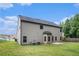 Back of home featuring a yard and a patio at 3225 Rex Ridge Dr, Rex, GA 30273